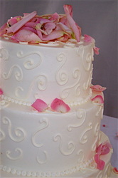 Swirls and rose petals buttercream wedding cake.  Chapel Hill, NC
