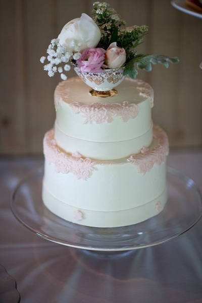 Delicate tea cup wedding cake with lace applique.
Machester, VT
