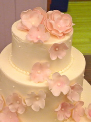 Fondant flowers on buttercream wedding cake.  Raleigh, NC