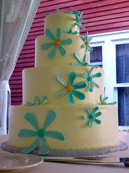 Blue sugar daisies on buttercream wedding cake.  Hillsborough, NC